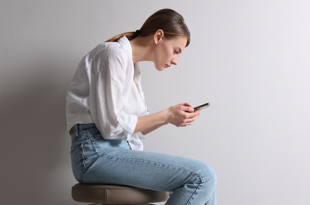Illustration showing a side view of seated posture